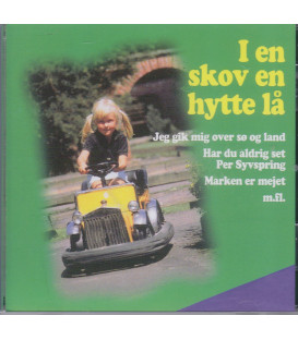 I en skov en hytte lå